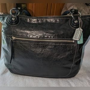 Coach black leather large tote bag.